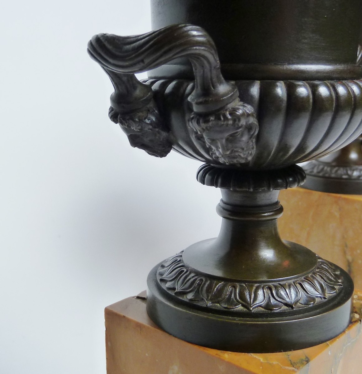 Pair Charles X Bronze Urns on Sienna marble base